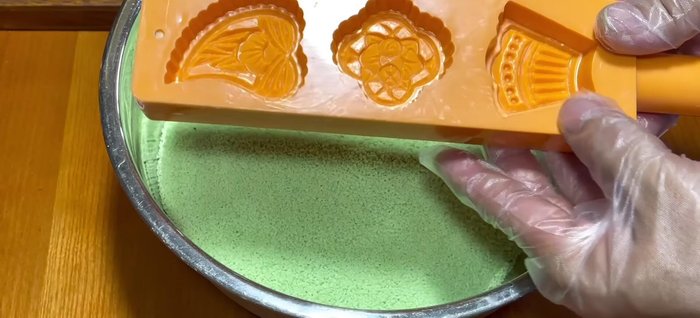 Press the dough firmly into cake molds.