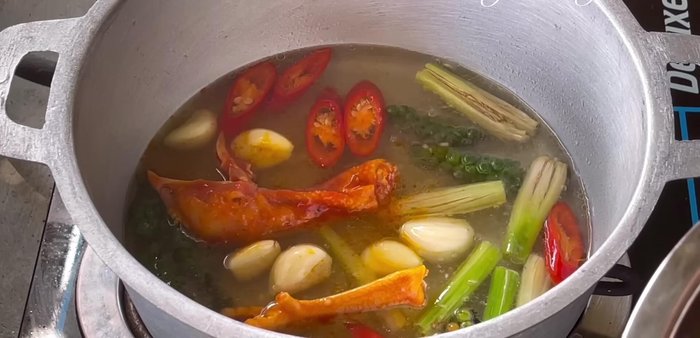 Steam the chicken: Add coconut water (or filtered water) to the pot with the aromatics. Bring to a boil, then add the marinated chicken. Steam over medium-low heat for 20-25 minutes, occasionally basting the chicken with the sauce.