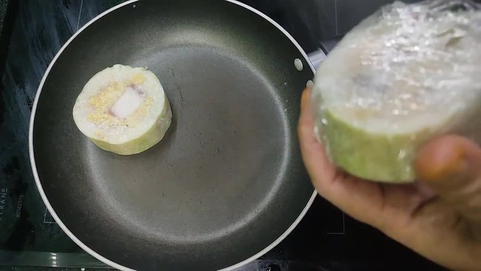 Cut the Banh Chung into small pieces. (If not already done when freezing)