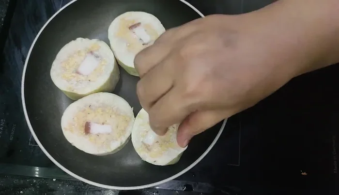 Let the Banh Chung sit at room temperature for about 15 minutes to soften.
