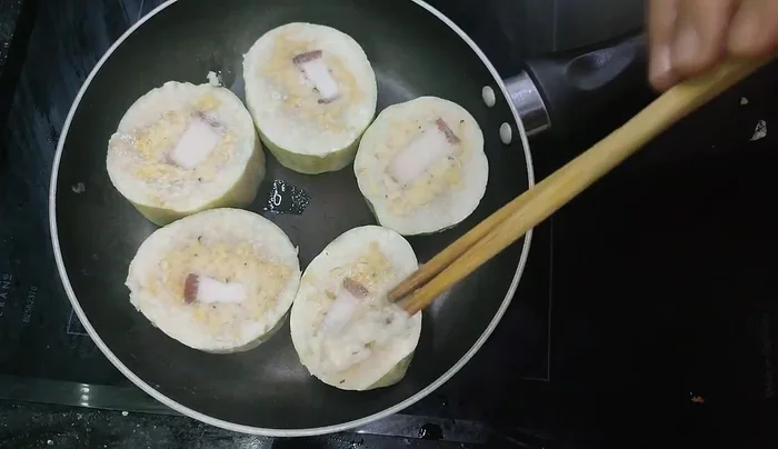 Remove the membrane from each piece.