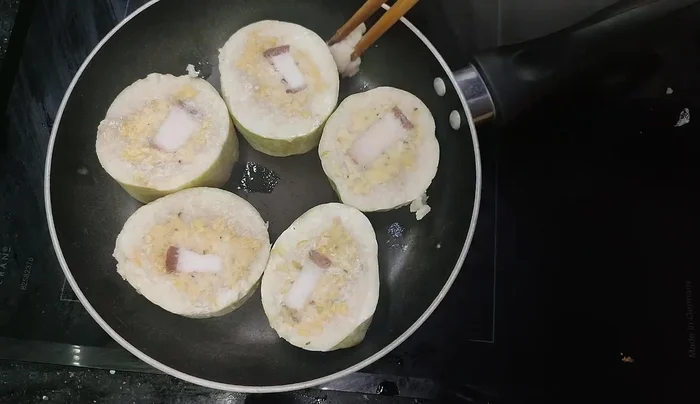 Add a little cooking oil or lard to the frying pan.