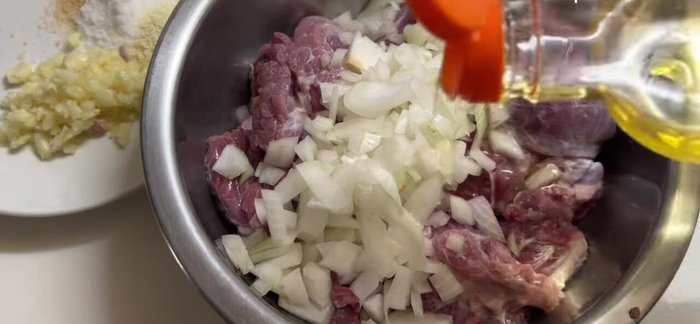 Finely chop the onion and marinate the beef with onion, minced garlic, seasoning powder, salt, sugar, and cooking oil. Wrap and refrigerate for 8-10 hours.