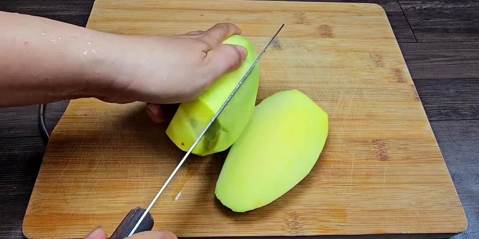 Prepare the mango: Peel and thinly slice the mango. (135.48)