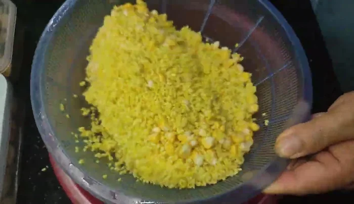 Place the rice in a steamer, and put half (or whole) chicken on top.