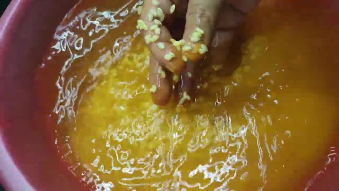 Soak the sticky rice with a little turmeric for color. Then soak in cold water for about 8 hours to soften.