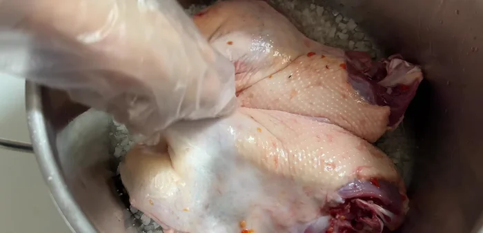 Cover the pot and steam over low heat for 13-15 minutes. After 7 minutes, flip the duck and steam for another 8 minutes.