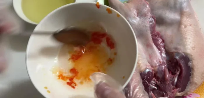 Rub the salt and oil mixture evenly onto the duck.