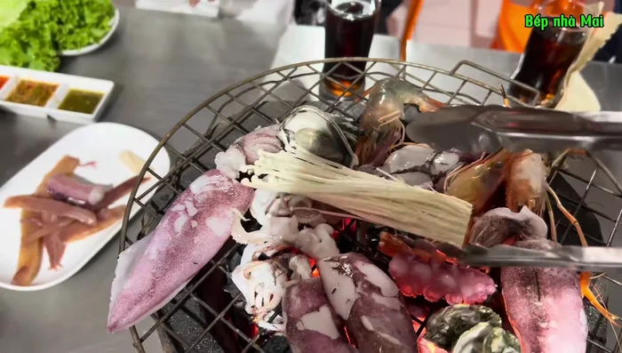 Prepare other ingredients such as mushrooms, vegetables (kimchi, various Thai mushrooms), noodles, and tofu. The transcript mentions a variety of vegetable choices and the use of kimchi.