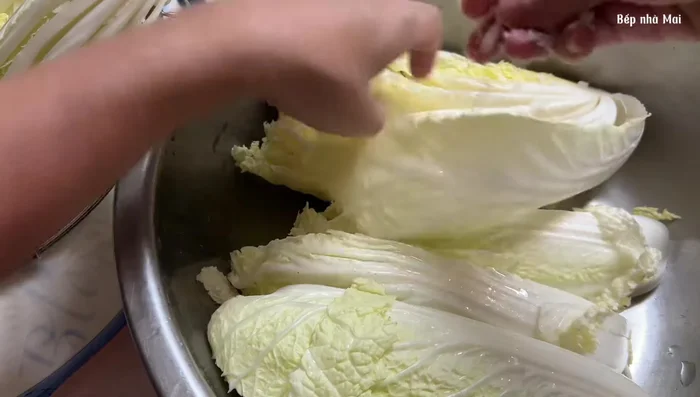After about 5 hours, turn the cabbage over to ensure the salt soaks into all the leaves. After 15 hours, the cabbage should be soft.