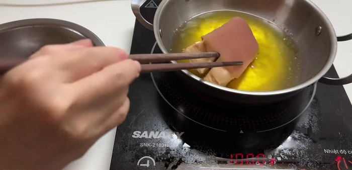 Fry the pork belly over medium heat for about 10 minutes, flipping frequently, until cooked through.