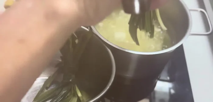 Remove the pandan leaves. Add sugar and stir until dissolved.
