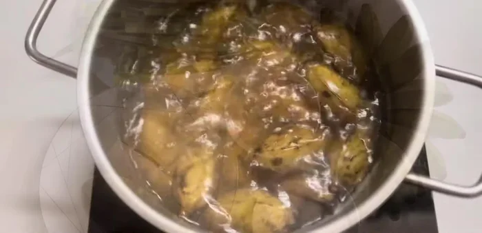 Wash the wax bananas. Boil them for about 10 minutes, then peel and discard the skins.