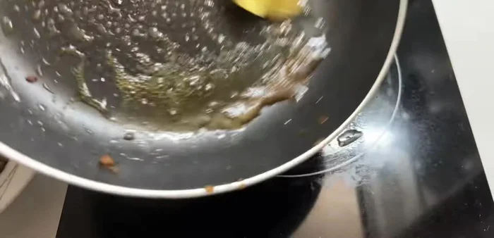 Add butter to the pan and stir-fry the onions and bell peppers until slightly cooked.