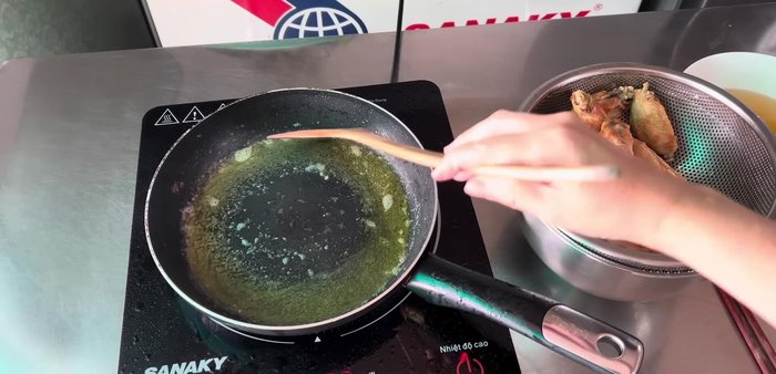 Add butter and Vo Phi garlic to the pan; let the garlic brown slightly.