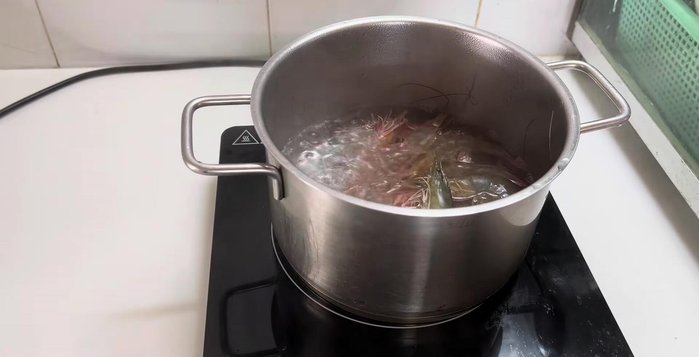Boil the shrimp for about 4 minutes until cooked, then transfer to ice water.