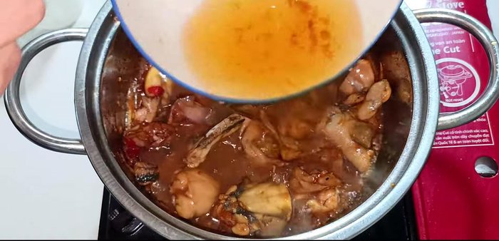 Add 200ml of water and simmer until the sauce thickens. Add the remaining caramel water for color.
