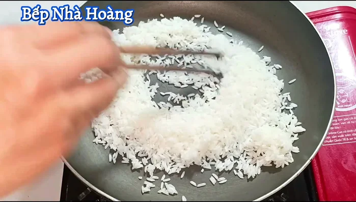 Roast rice until grains turn opaque white. (Optional: If you skip roasting, add rice directly to the pot).
