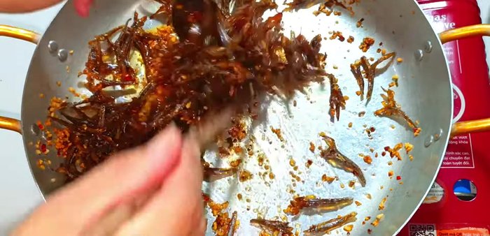Cook until the sauce is completely dry, stirring occasionally to ensure even coating and prevent burning. This helps preserve the dish.
