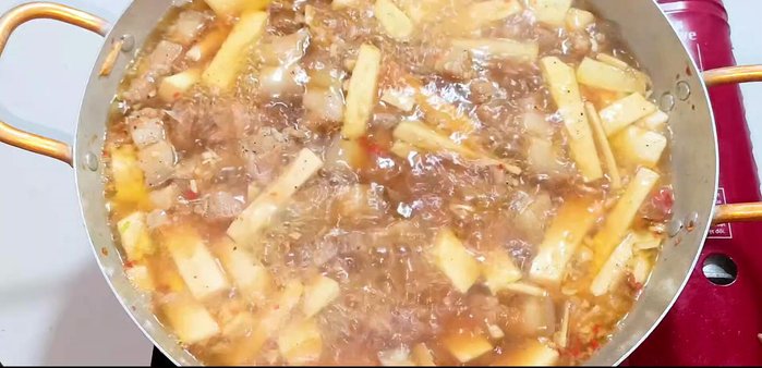 Bring to a boil, then reduce heat and simmer until the liquid thickens, stirring occasionally to ensure even cooking and prevent sticking.