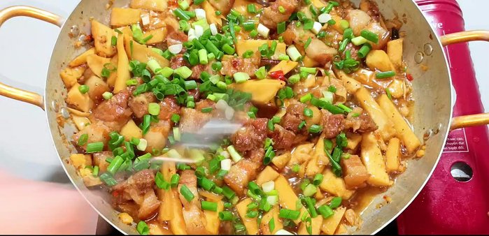 Add green onions; stir well until cooked.