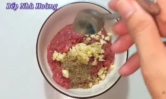Marinate the beef: Add ground pepper, MSG, seasoning powder, sugar, and wheat oil. Mix well and let it marinate for about 5 minutes.