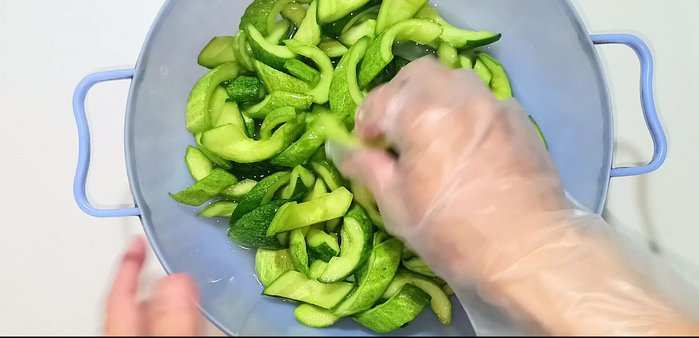 After 2 hours, mix the cucumber well to distribute the water evenly. The cucumbers should be a bit chewy.