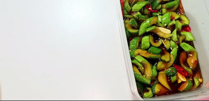 After 5 hours (or overnight), the cucumbers will be soft, colored, and infused with spices. Refrigerate to preserve crispness.
