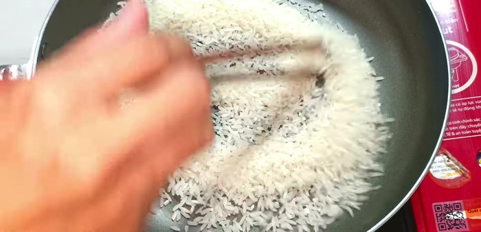 Roast the rice until the grains turn opaque white.
