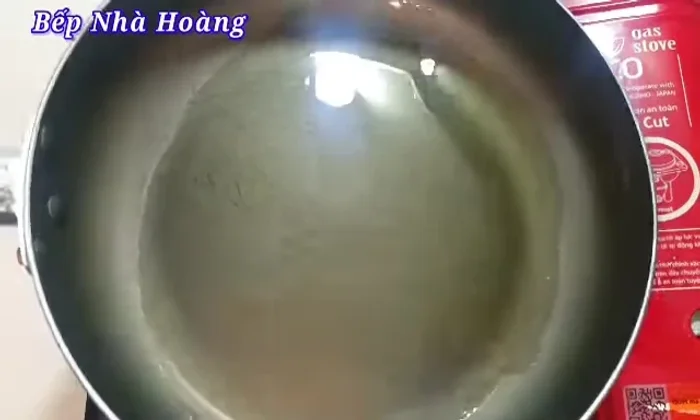In a separate pan, heat cooking oil and add the fish sauce marinade. Bring to a boil.