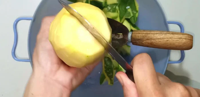 Cut the papaya open, remove the seeds, and wash thoroughly.