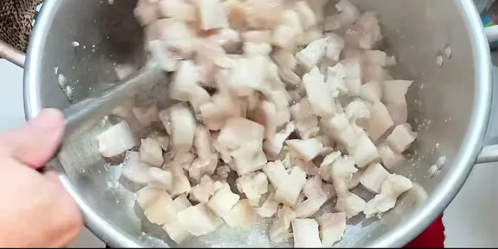 Crisp and season: Once the fat is crispy and golden brown (approximately 90 minutes), add the remaining shallots and ½ teaspoon of salt. Stir continuously to prevent burning and achieve even browning.