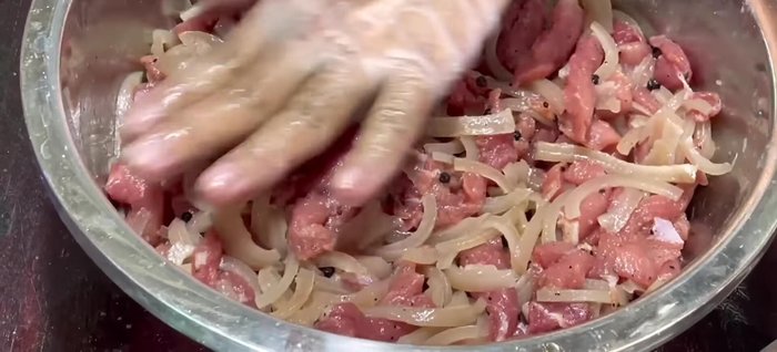Stuff the meat mixture tightly into the pig bladders. Sew or fasten the bladders closed.