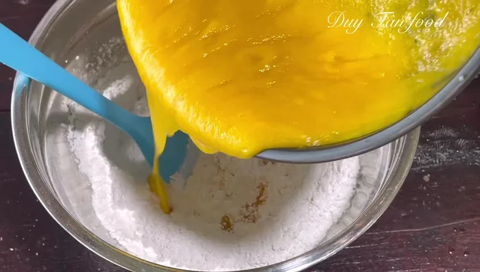 Add cooked jackfruit to the dough mixture and stir until well combined.