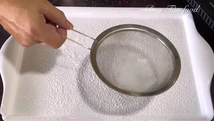 Roll the dough into small balls (smaller than a thumb). Sprinkle with tapioca starch to prevent sticking.