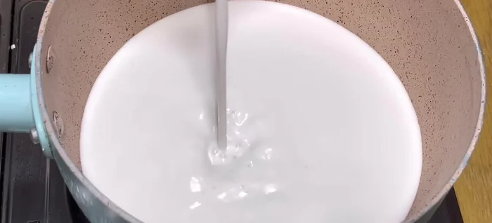 Prepare the wet ingredients for the coffee layer. In a separate pot, combine coconut milk, coffee water, and sugar. Cook over low heat until the sugar dissolves and it simmers.