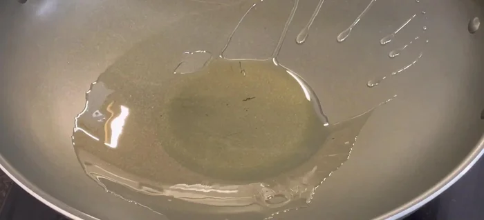 Prepare the hot pot base: Heat oil in a pot. Sauté shallots, lemongrass, galangal, and lemon leaves until fragrant.