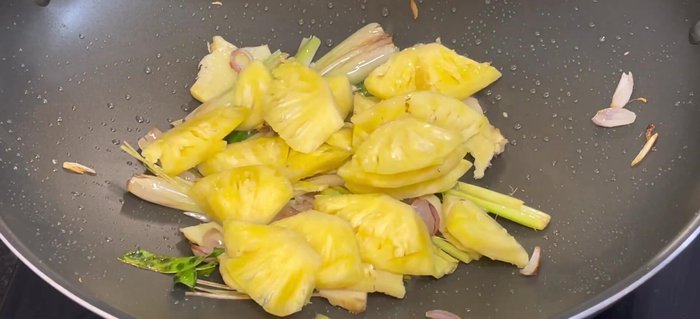 Add pineapple and stir-fry until fragrant (about 30 seconds).