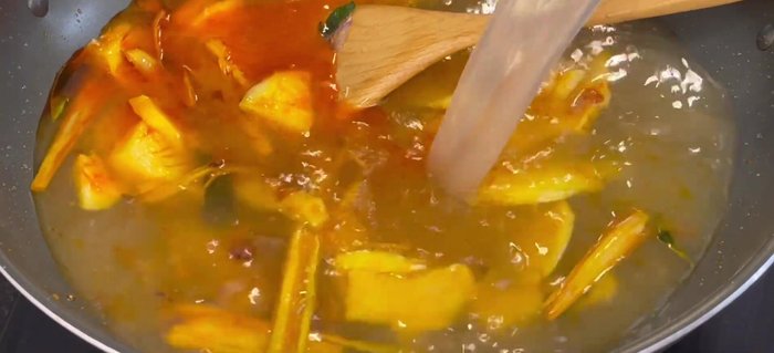 Pour in the prepared broth, sugar, seasoning powder, MSG, salt, and fish sauce. Bring to a boil.