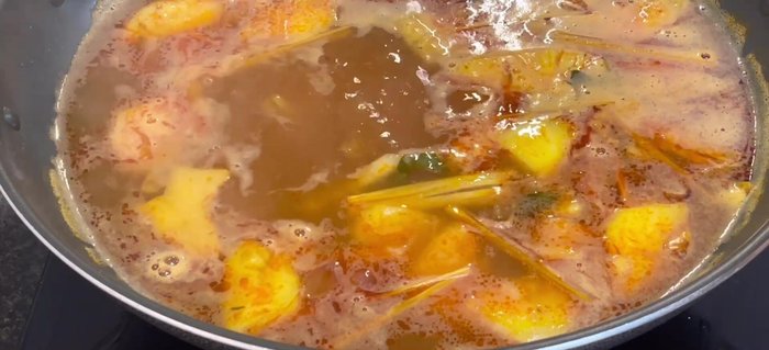 Add lemongrass juice. Simmer for 5-7 minutes until flavors combine.