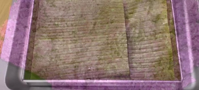 Transfer the sticky rice mixture to a prepared mold (lined with banana leaf or wax paper). Press firmly to compact it.