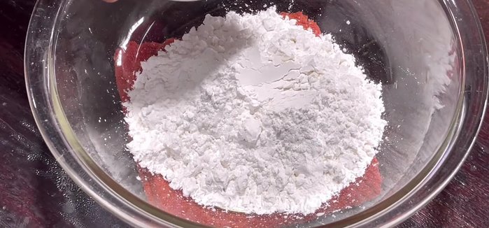 Combine the dough: Add 30g all-purpose flour to the purple leaf mixture. Stir until combined. The mixture will be hot, add it gradually while mixing.