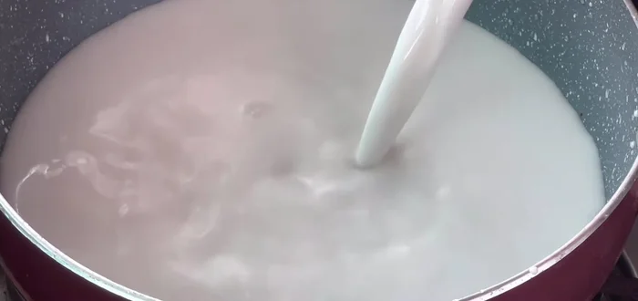 Make coconut milk topping (optional): Cook coconut milk with sugar and salt until slightly thickened. Add a slurry of rice flour and water to thicken further.