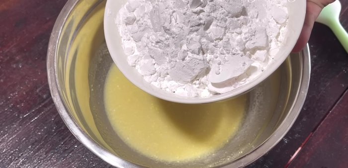 Add tapioca starch, vanilla flavor, and optional pandan essence or food coloring. Mix well with a whisk, then knead for 5-7 minutes until smooth.