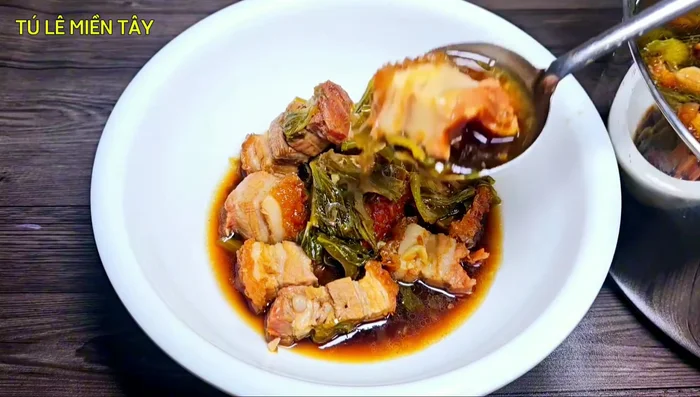Serve: Once cooked, remove the roasted pork and pickled cabbage from the pot and serve.