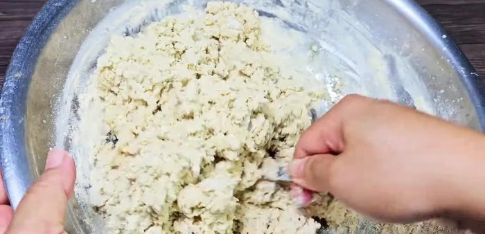 Combine the ground tofu leaves with the flour mixture and knead until the dough is sticky but slightly loose. Let it rest for 30 minutes.