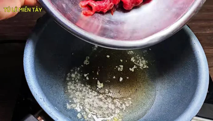 Stir-fry the beef: Heat oil in a wok or frying pan. Add garlic and sauté until fragrant. Add the marinated beef and stir-fry until cooked through.