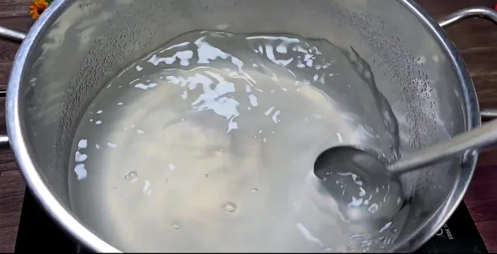 Cook the mixture, stirring constantly with a rack to prevent sticking and burning. Skim off any foam that forms.