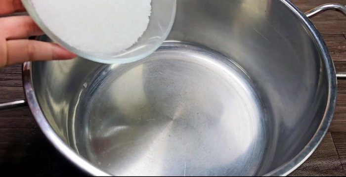 Combine sugar and jelly in a pot.