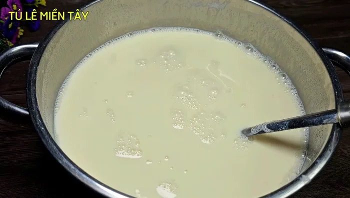 Let the mixture cool slightly, then pour into cups with holes for a 3-color effect (use syrups for coloring).